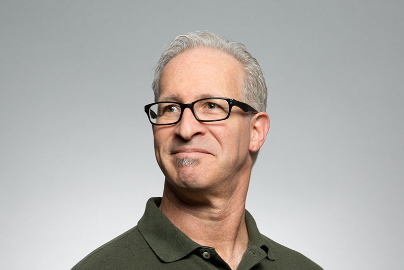 Smiling man looking left